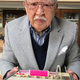 Shigeichi Negishi with his invention, the “Sparko Box,” the first karaoke machine.